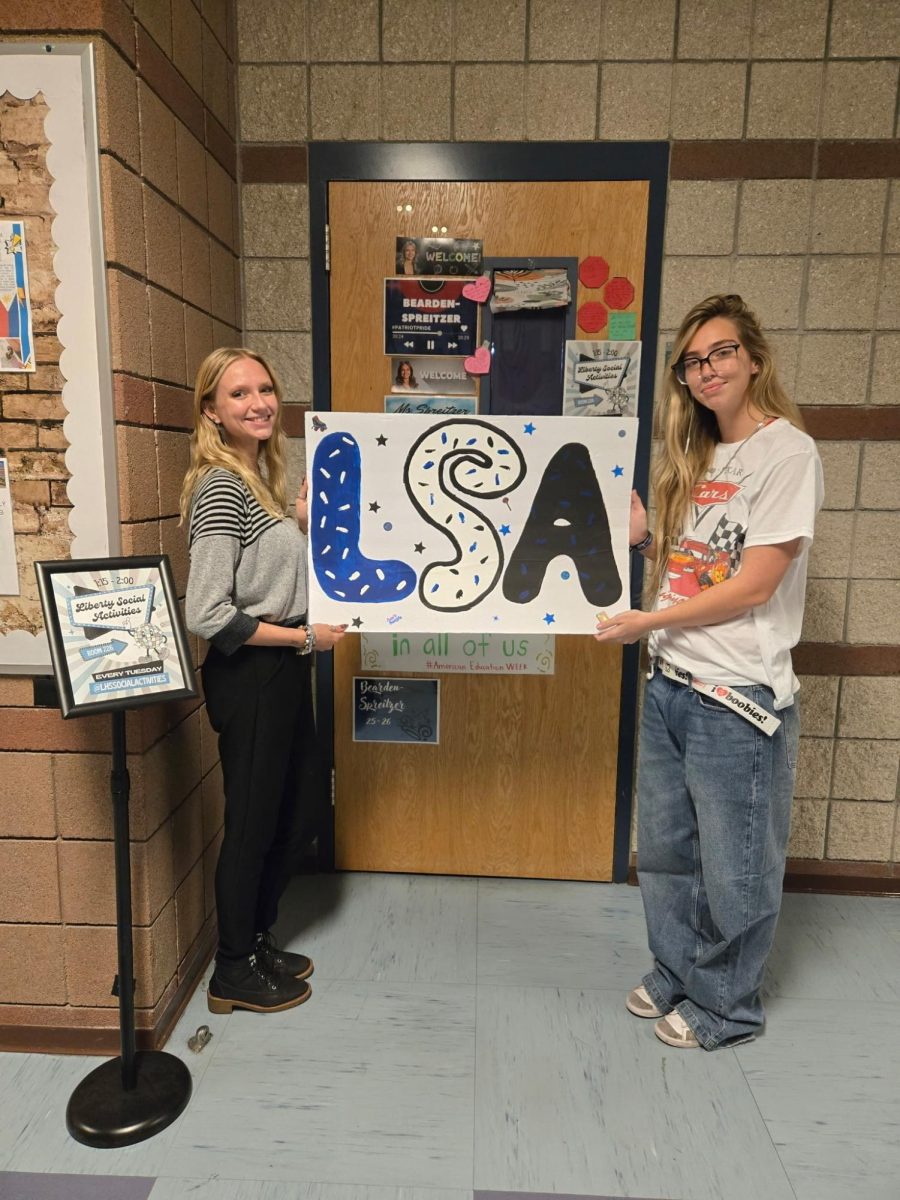 Mrs. Bearden-Spreitzer LSA's club advisor and Kiki Mumolo, LSA's president