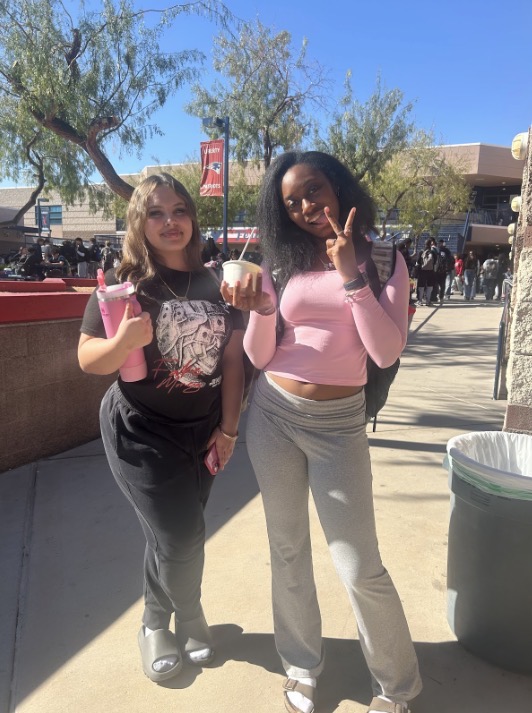 Liberty High School Juniors, Samia and Adasia posing for a picture after an interview.