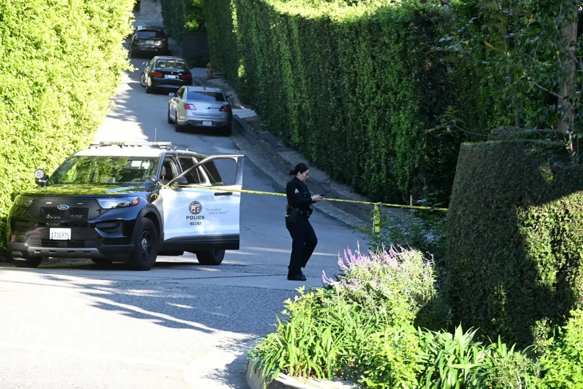 Police outside of Rihanna's Beverly Hills Home on March 8 after the shooting